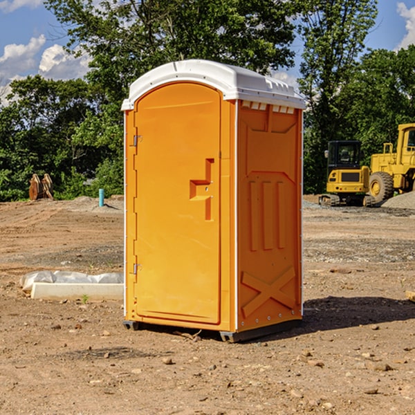 how often are the porta potties cleaned and serviced during a rental period in Combs